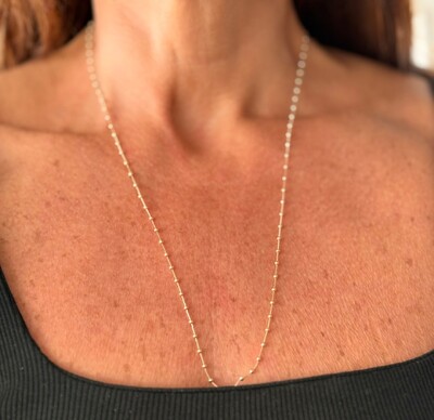 Foto Colar Longo Bolinhas Espaçadas em Dourado