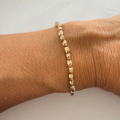 FotoPulseira Silicone Peças Douradas