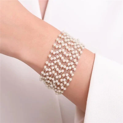 FotoPulseira 12 Fios De Perolinhas em Ródio