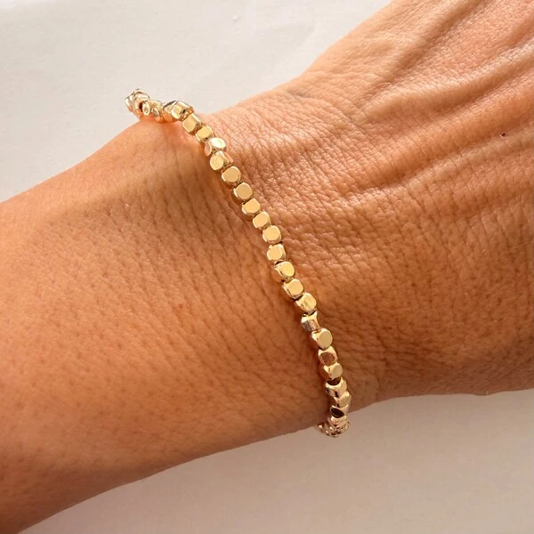 Pulseira Silicone Peças Douradas