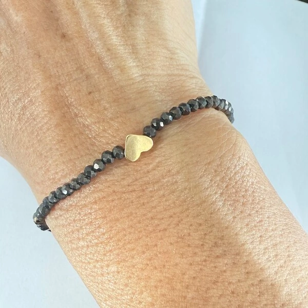 Pulseira Cristal no Silicone com Coração de Hematita em Dourado