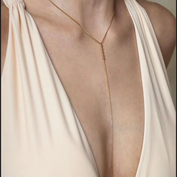 Colar Gravatinha com Bolinhas em Dourado