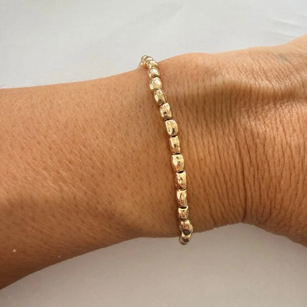 Pulseira Silicone Peças Douradas