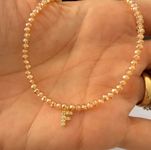 Colar Cristal Dourado com Letra Inicial Cravejada com Zircônias em Dourado