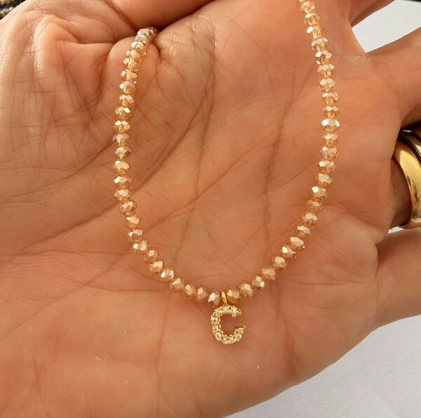 Colar Cristal Dourado com Letra Inicial Cravejada com Zircônias em Dourado