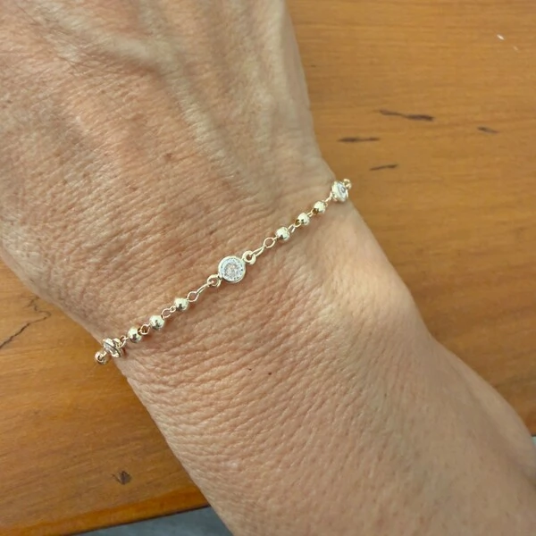 Pulseira Bolinhas com Pontos de Luz em Dourado