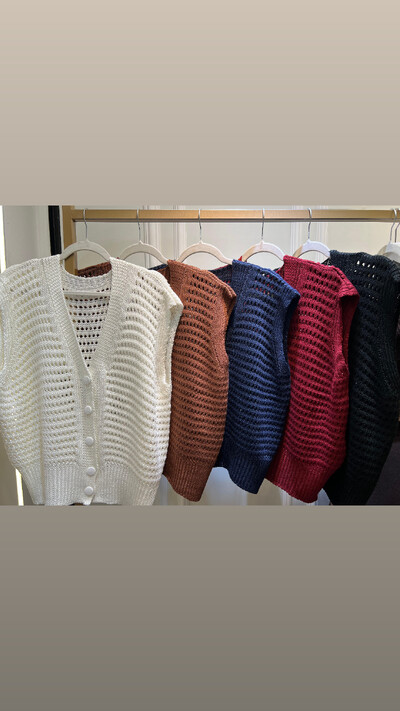 Foto colete tricot botao encapado planet