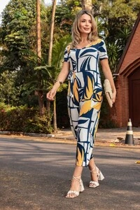 Macacão em malha crepiada com amarração Encanto