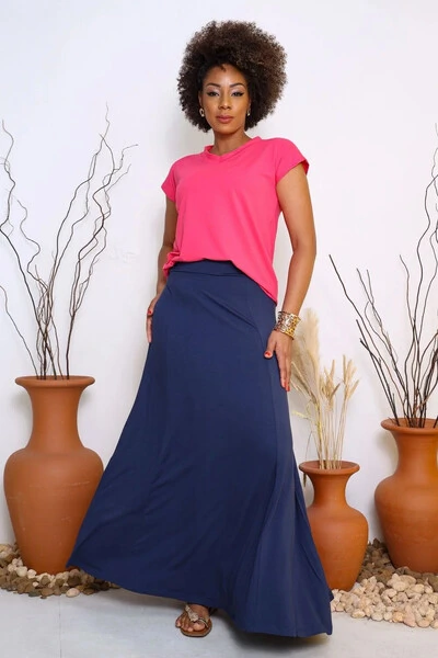 Saia verde combina com que cor de blusa? Saiba agora