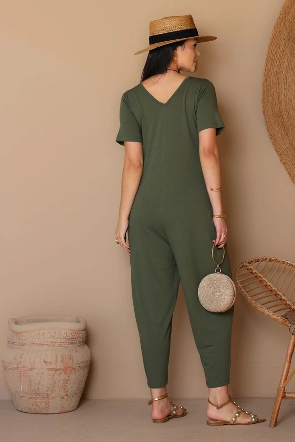 Macacão em malha crepiada com amarração Encanto