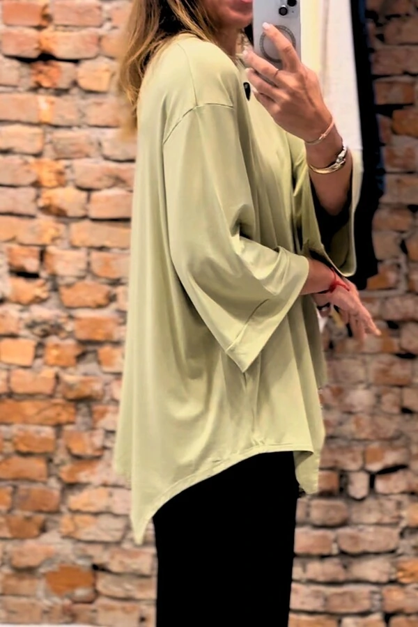 Blusa Assimétrica com bicos em malha Mila