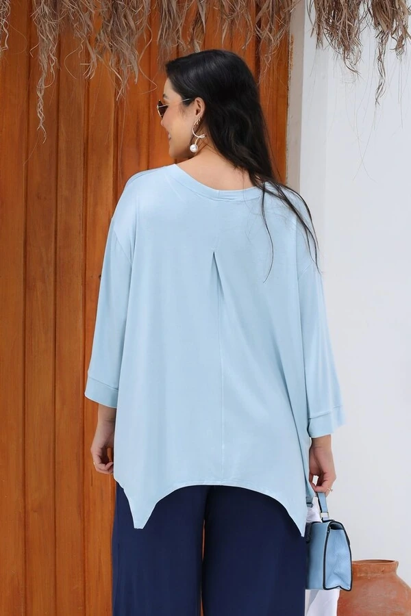 Blusa Assimétrica com bicos em malha Mila