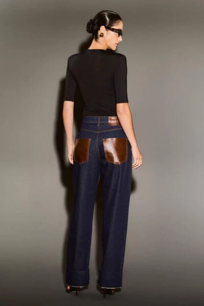 FotoCalça Jeans Bolso Couro