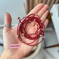 Choker Camurça Esferas