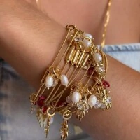 Pulseira Corda de Violão com Pingente Filhos