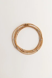 Pulseira Dourada Corda de Violão Bolinhas Prateadas
