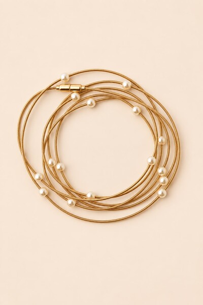 Foto Pulseira Corda de Violão Pérola Dourado