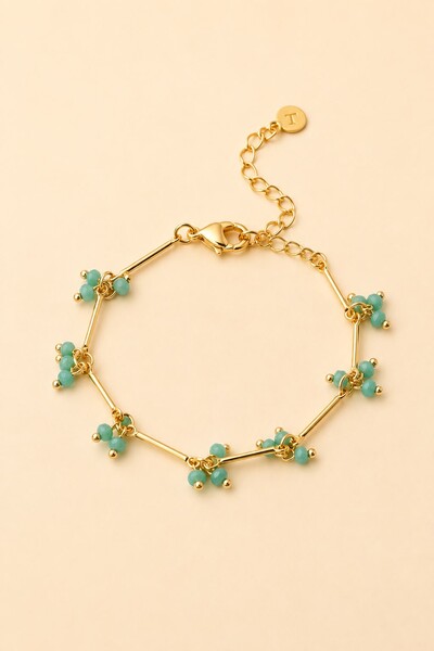 Foto Pulseira Dourada Palitos Cachos Cristal Azul