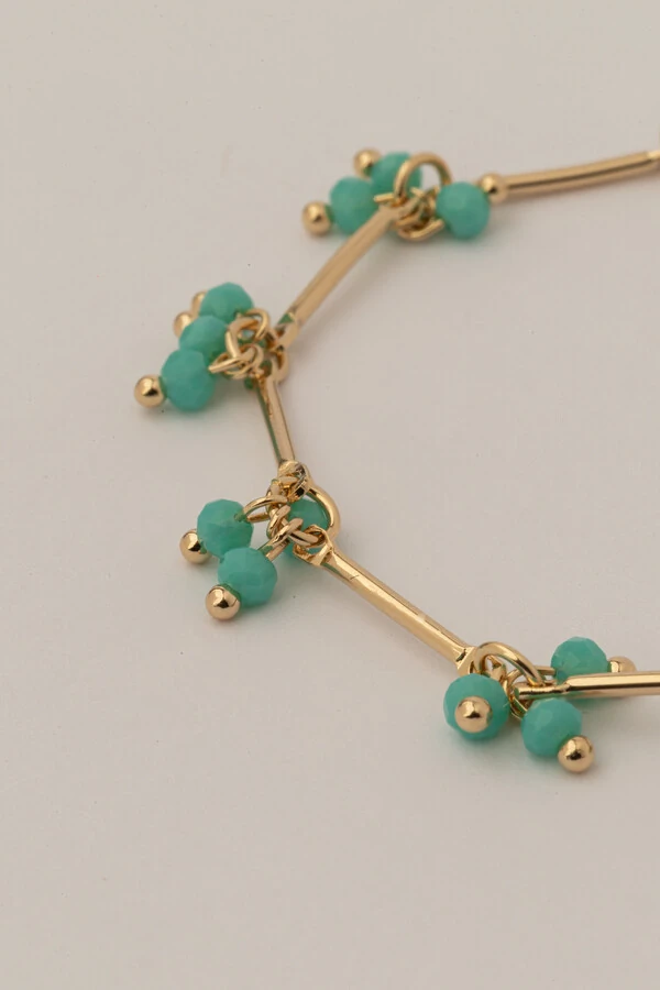 Pulseira Dourada Palitos Cachos Cristal Azul